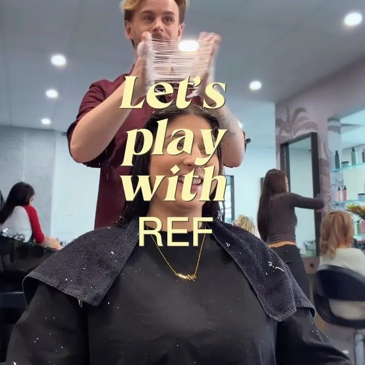 Stylist working with hair colour inside the salon